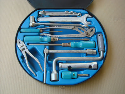 A picture containing tool, blue, wrenchDescription automatically generated